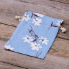 Sacchetti tipo lino con stampa 15 x 20 cm - naturale / fiori blu In viaggio