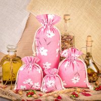 Sacco tipo lino con stampa 30 x 40 cm - naturale / fiori rosa Sacchi di lino