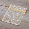 Sacchetti di organza 12 x 15 cm - Natale / 8 Cosmetici